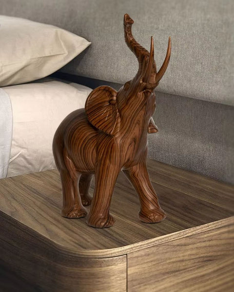 Statua elefante in resina simil legno 18 cm